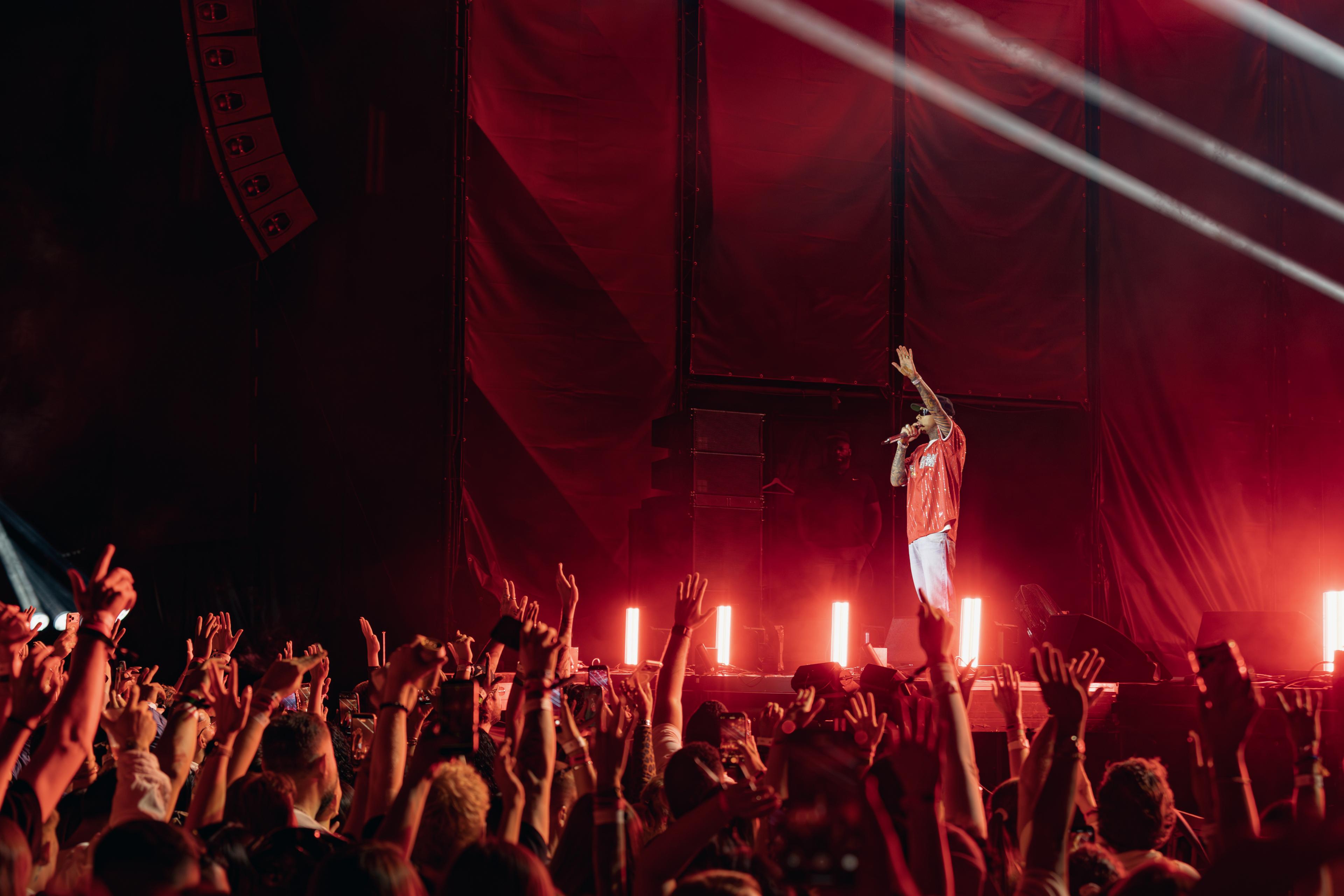 Singer performing under stage lights